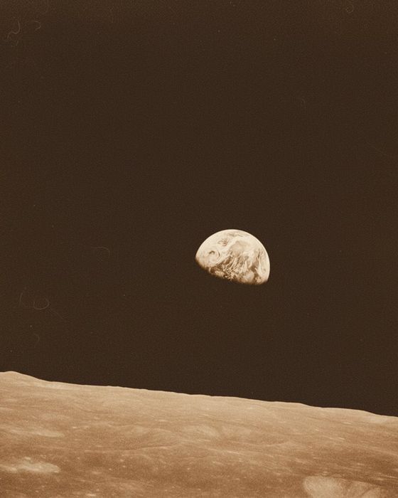 Warm vintage polaroid of Earthrise seen from Apollo 8 (NASA, 1968) — the photo behind the sample song 'Tethered to the Blue'